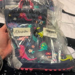 Girl’s dinosaur galoshes